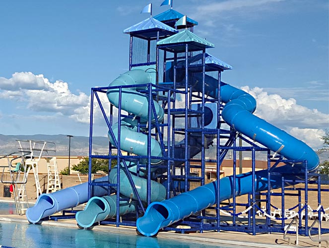 Commercial Water Slides for Pools, Hotels, Clubs and more. Multiple Water Slide at swimming pool